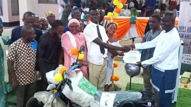 • Mr Agyekum receiving his award from Dr Hafiz Bin Salih (right)