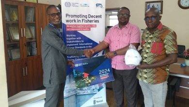 Mr Mensah presenting items to Mr Frank Aihoon, President of GTA, and Johnie Kusitor-Gborson, Secretary, GTA