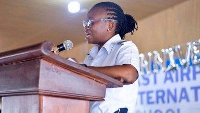 • Wing Commander Hilda Akuoko Adjei (inset) speaking to the pupils