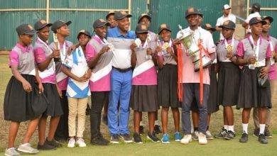 • Mr Ayeh (sixth left) with Kwabena Poku (with trophy) and other participants