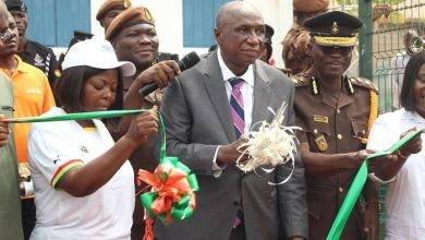 • Mr Derry (in suit) joined by officers of the centre and GNGC officials to cut the tape for the facilityLimited