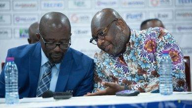 Mr Okraku (left) and Executive Committee Member, Dr Randy Abbey, in a tete-a-tete during the meeting