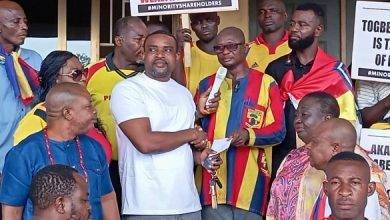 • Mr Herman Hesse Jr (in white) receiving the petition from Mr Asabre