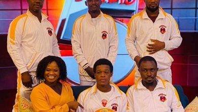 • Nyantakyi (seated middle) with management and technical team members and Gloria Peprah (seated left)