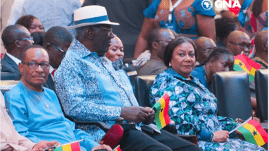 • Former President Kufuor (in a hat) at the event