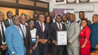 • Team OISL displaying the award