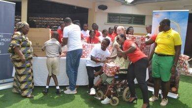• Ms Shirley Kum (second from right) with Ms Mariama Obeng (left) with some students of the school during the presentation Photo: Victor A. Buxton