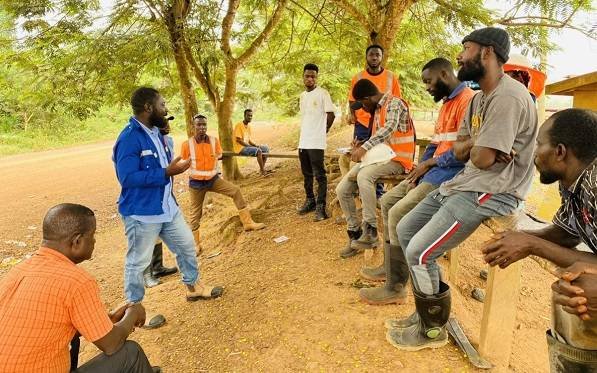 • Genser Energy official engaging with some of the workers on the project