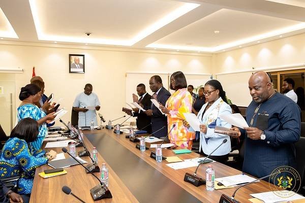 • The new Board Members being sworn into office