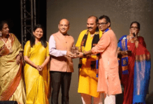 Mr Jee receiving RAM TEMPLE Memento from Mr Pandey. With them are other dignitaries