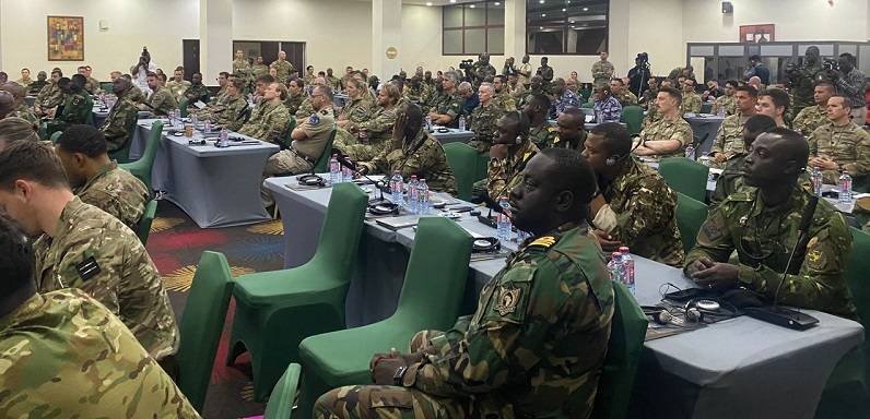 • Brigadier General Hagan (inset) addressing the military personnel