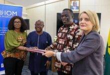 • From left: Ms Diallo, Mr Kwofie, Minister of Employment and Labour Relations, Ignatius Baffour-Awuah, and Ms Giger displaying the contract document
