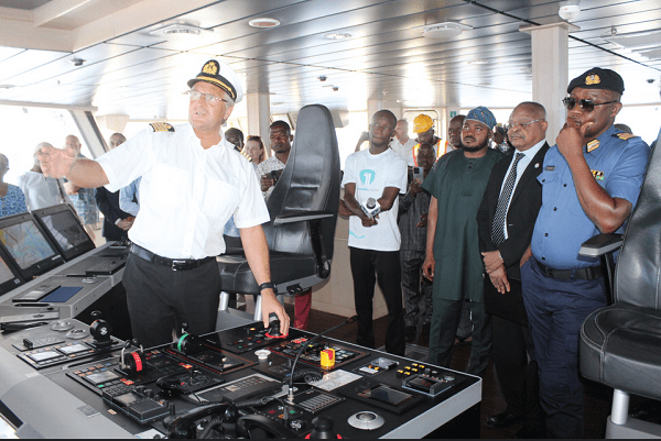 Captain Tomny Steffensen (infront) briefing Mr Abdul-Aziz Ayaba (third from right) and other officials on board of the Dr Fridtj of Nansen research vessel at Tema port Photo: Ebo Gorman