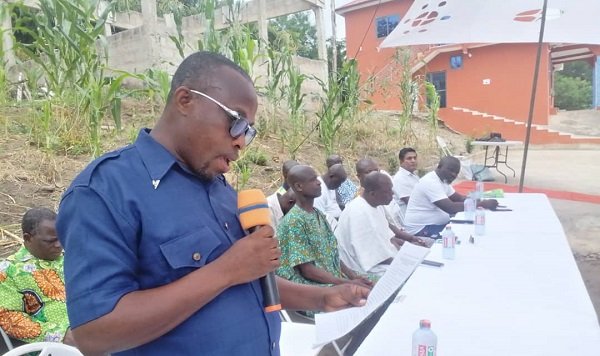 Mr Francis Asamani, Adaklu District Director of NCCE speaking in the meeting