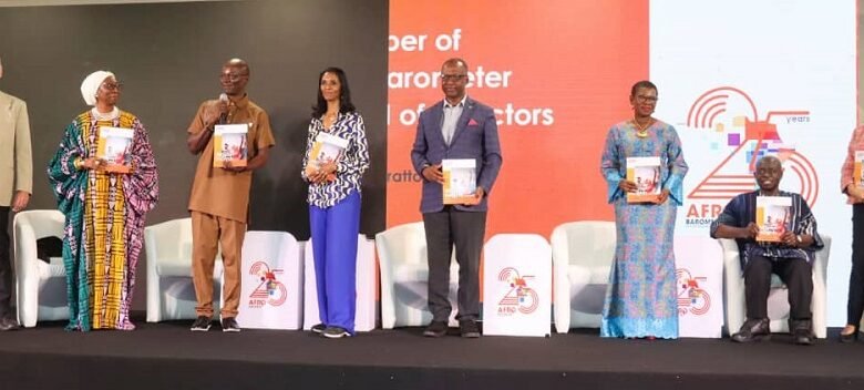 Mr Joseph Asunka, CEO, Afrobarometer (third from right) with other dignitaries launching the report