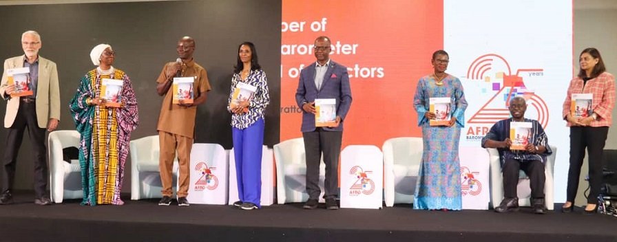 Mr Joseph Asunka, CEO, Afrobarometer (third from right) with other dignitaries launching the report