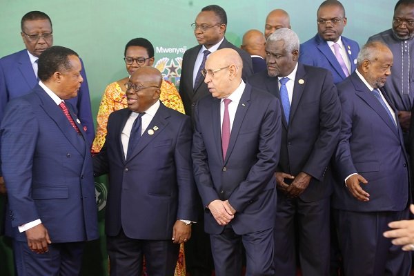 President Akufo-Addo (second from left), interacting with President Denis Sassou Nguesso (left), President of Congo Brazzaville after the opening session