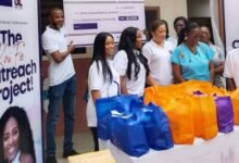 Dr Maame Yaa Danko ( with sthetoscope)flank on her the left by Hajia Kabba