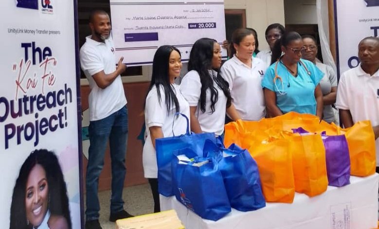 Dr Maame Yaa Danko ( with sthetoscope)flank on her the left by Hajia Kabba