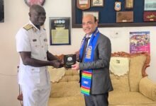 • Commodore Emmanuel Ayesu Kwafo (left) presenting a memento to Mr Manish Gupta to thank him