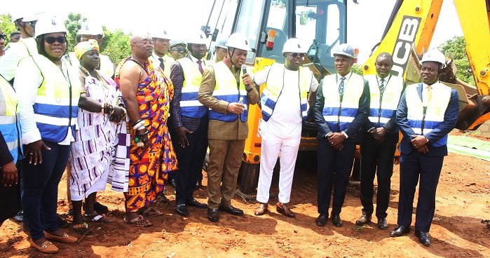 • Rev. Stephen Wengam (middle) praying for the commencement of the project Photo: Anita Nyarko-Yirenkyi