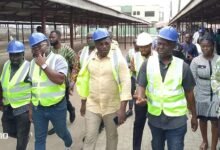 • Mr Martin Adjei-Mensah Korsah (second from right) and the team touring one of the markets