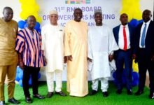 • The Chancellor (third from right) together with other Board Members and the Deputy Minister (second from left) after the meeting