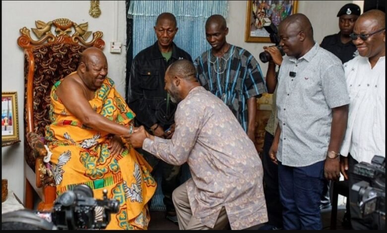 Dr Opoku in a handshake with Konor Sakite II seated