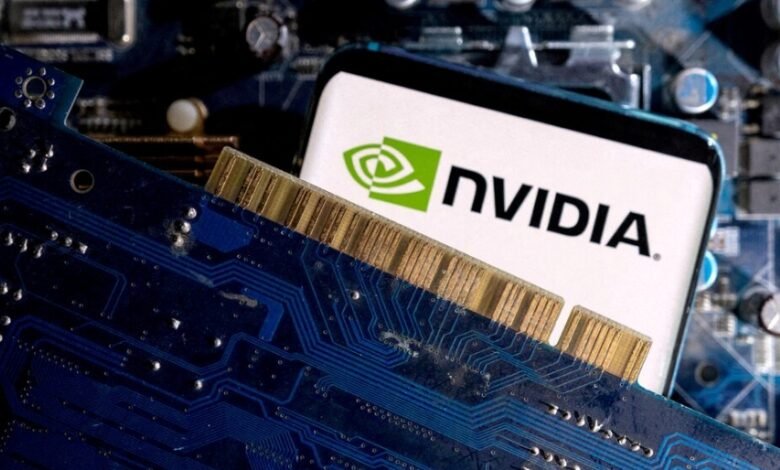 [1/2]A smartphone with a displayed NVIDIA logo is placed on a computer motherboard in this illustration taken March 6, 2023. REUTERS/Dado Ruvic/Illustration/File Photo Purchase Licensing Rights