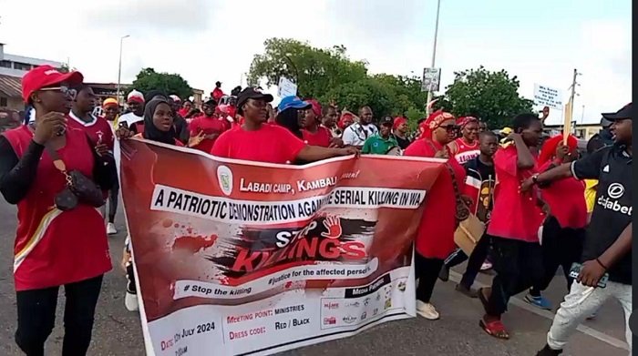 The demostrators on the streets of Wa in a protest