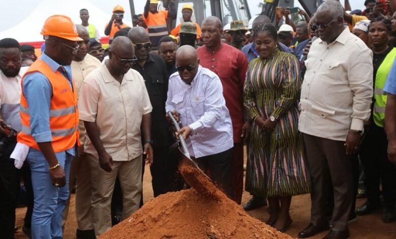 • President Akufo-Addo (with a shovel) cutting sod for the construction of the Adentan-Dodowa road. With him are Mr Francis Asenso Boakye (second from left) and other dignitaries