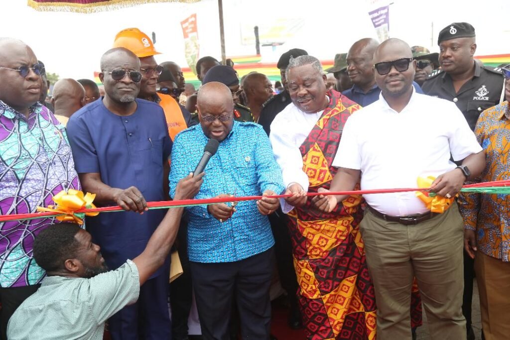 • President Akufo-Addo (middle), being assisted by King (Dr) Odaifio Welentsi III (second from right) and other dignitaries to inaugurate the Borteyman road in Accra