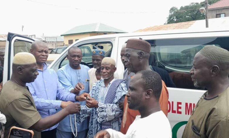 • Mr Yussif Sulemana (fourth from right) presenting the keys to the machines to Bole Chief Imam, Alhaji Mohammed Iddrisu