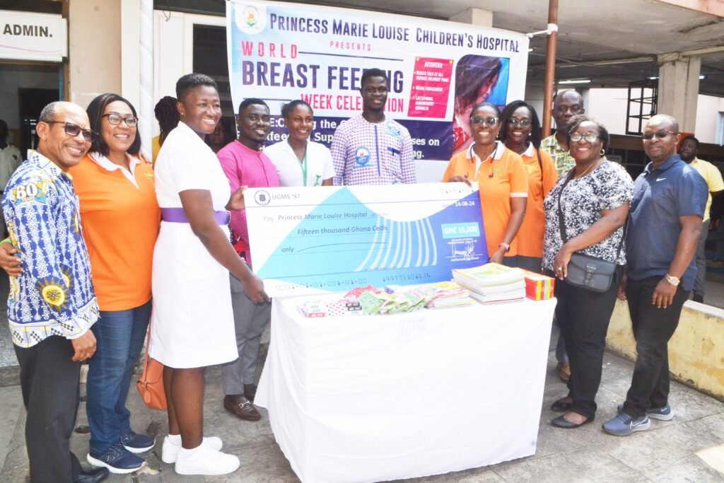 • Ms Charity Ankomah (third from left) assisted by Mr Rockson (fourth from left) to receive the items and the dummy cheque from Dr Nyarko (third from right).With them include Dr Kojo Essel (right) Photo: Victor A. Buxton