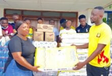 • Patrick Dodzi Senoo (right) donating the items to Naana Agyeiwaa, the hospital administrator