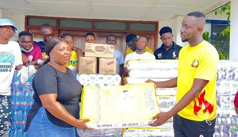 • Patrick Dodzi Senoo (right) donating the items to Naana Agyeiwaa, the hospital administrator