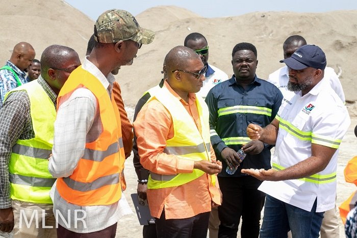 • Mr Kwaku Ampromfi (right) briefing Mr Dukar (middle) and other officials during the visit to the site