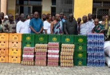 • Mr Daniel Nii Kwartei Titus Glover (fourth from right) with traditional leaders of La after the donation