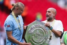 • Haaland and Pep Guardiola with the Community Shield