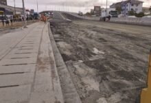 • Asphalt overlay on the Obetsebi- Lamptey Interchange in progress Photo: Victor A. Buxton