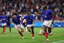 • Jean-Philippe Mateta of France celebrates scoring their second goal with teammates