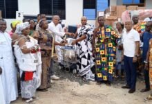 Mr. Ablakwa presenting the items to Torgbe Nego VI who received them on behalf of the hospital and the community.