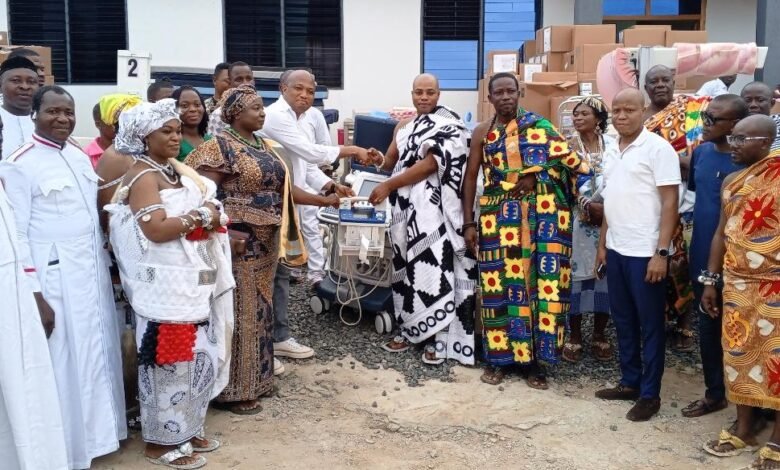 Mr. Ablakwa presenting the items to Torgbe Nego VI who received them on behalf of the hospital and the community.