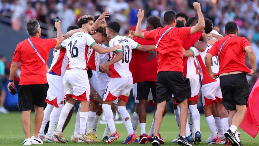 • Moroccan players celebrating their victory