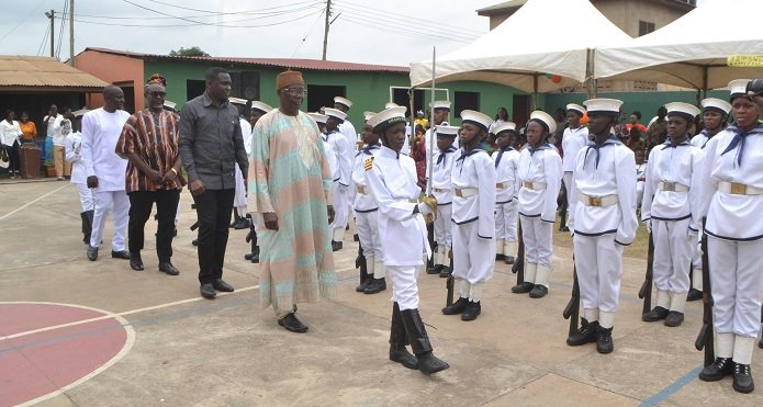 • Mr Budu (second from left) with Mr. Amago (left), Mr Siedu (second from right) inspecting the school cadet Photo: Victor A. Buxton