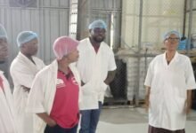 Ms Edusei (right) briefing the Absa Bank Ghana officials about the operations of Eden Tree