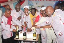 • Apostle Daniel Adu Asare (middle) together with his pastors cutting the anniversary cake Photo: Ebo Gorman