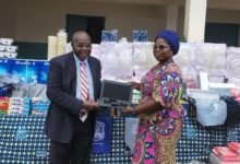 • Ms Nadia Annan receiving some of the items from Mr Quansah Quarcoo