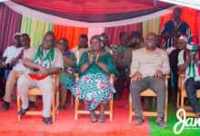 • Inset: Prof. Opoku-Agyemang (middle) responding to cheers from the crowd