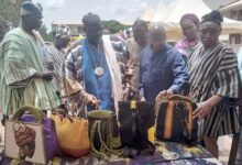 • Prof. Bawa (second from right) and some stakeholders inspecting the exhibited products